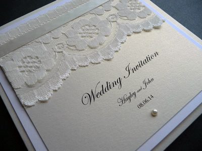 Ivory and silver pocketcard with lace and a silver colour scheme