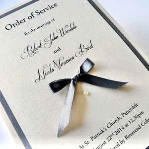 Order of Service booklet with satin grey bow