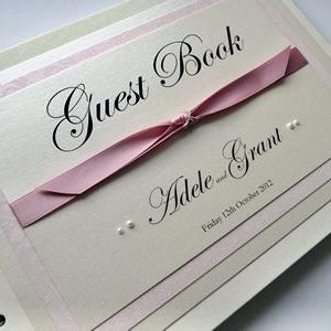 Pink and Ivory Wedding Guest Book with knotted ribbon