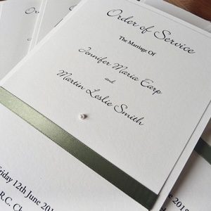 Order of Service booklet with sage green ribbon