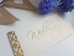 Damask Themed Gold Foiled and Ivory Pearlised Cheque Book Wedding Invitation