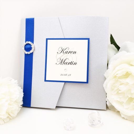 Silver & Royal Blue Fancy Pocketfold Wedding Invitation with a plaque and ribbon buckle