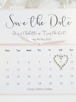 Blush Pink and White Calendar Style Save the Date with a Diamante Heart