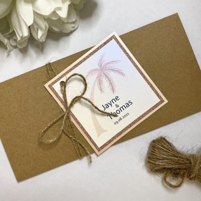 boarding pass style invitation with palm tress