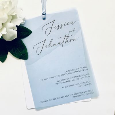 Light Blue vellum with matching Ribbon and crisp white back mount