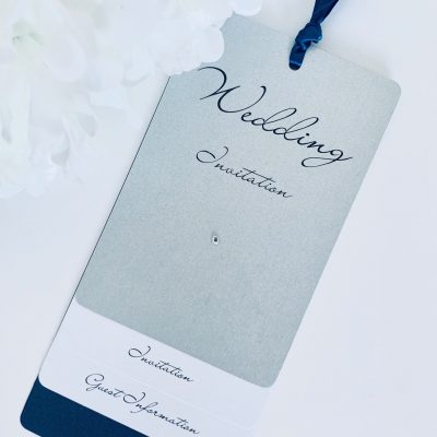 Navy and silver luggage tag style invitation