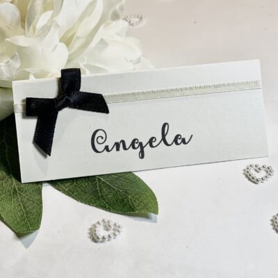 Monochrome name place card with tiny bow