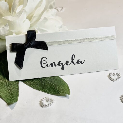 Monochrome name place card with tiny bow