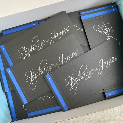 Black and silver personalised foiled invitations