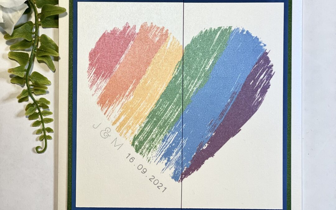 Gatefold invitation with paintbrush rainbow