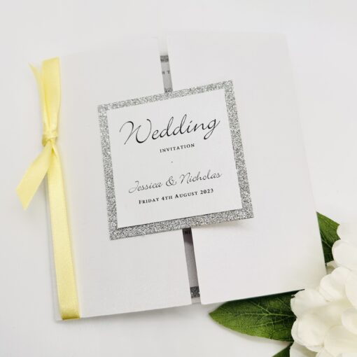 Gatefold with glitter and yellow ribbon