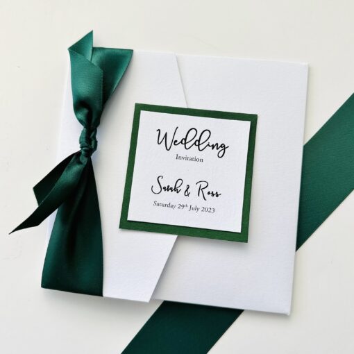 Pocketfold with oversized green satin bow