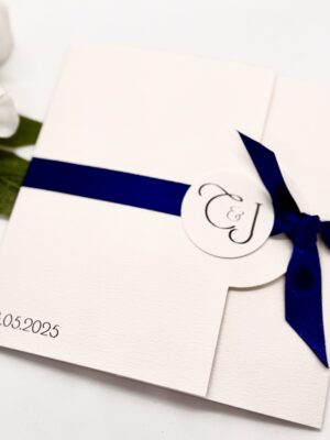 Folded Invitation with personalised initials and knotted ribbon