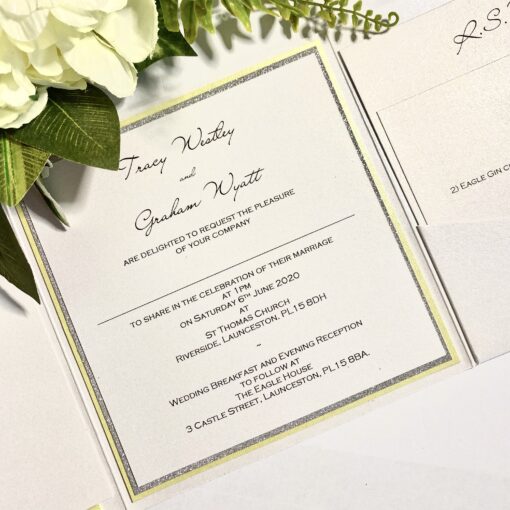 yellow and silver pocket fold invitation with plaque