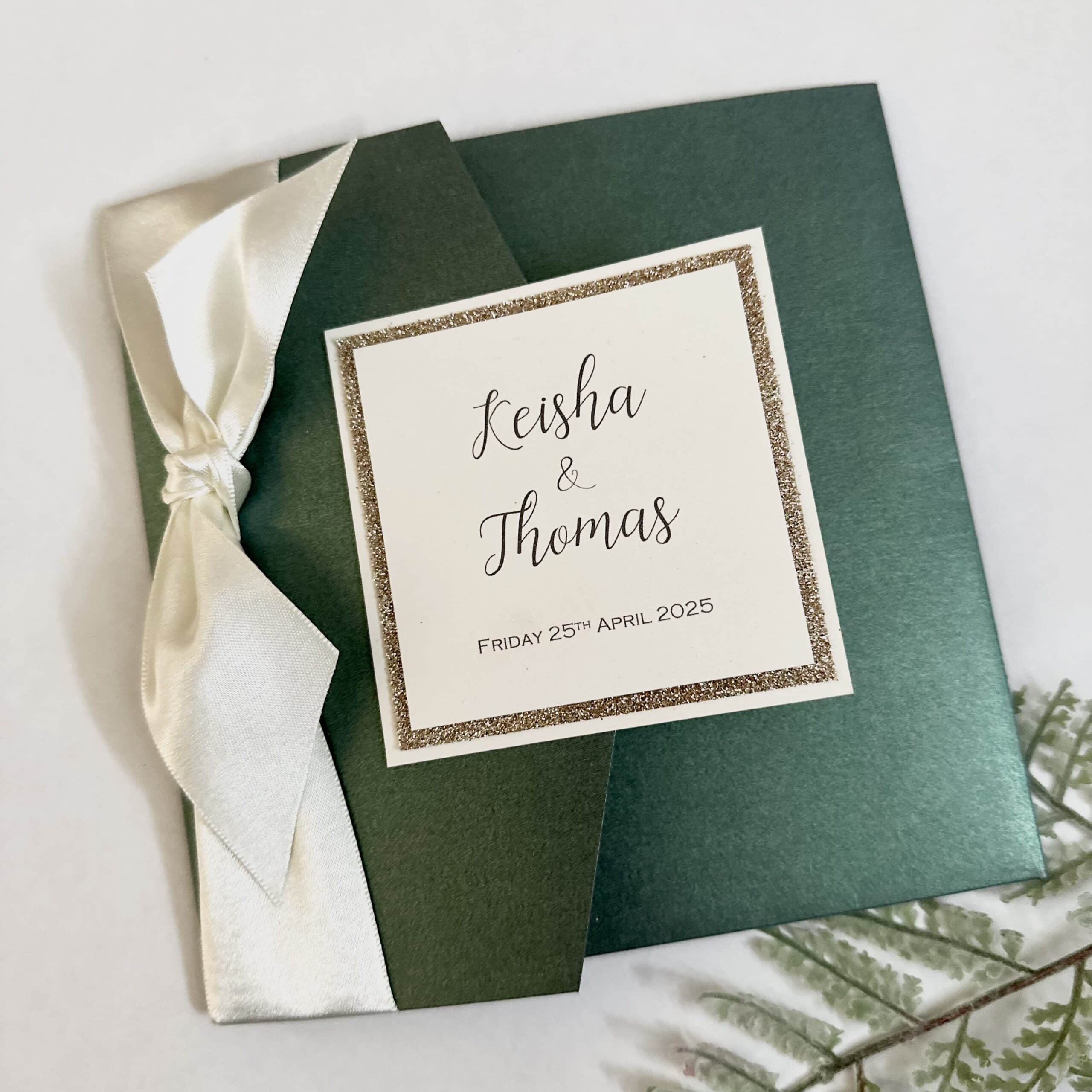 Emerald green pocketfold wedding invitation with large bow Emerald green pocketfold wedding invitation with large bow