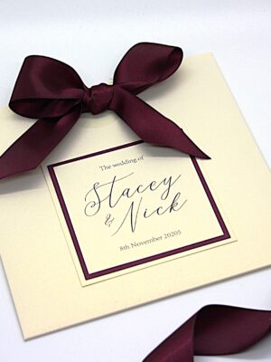 Wallet Style Wedding Invitation with a Large Burgundy Red Bow
