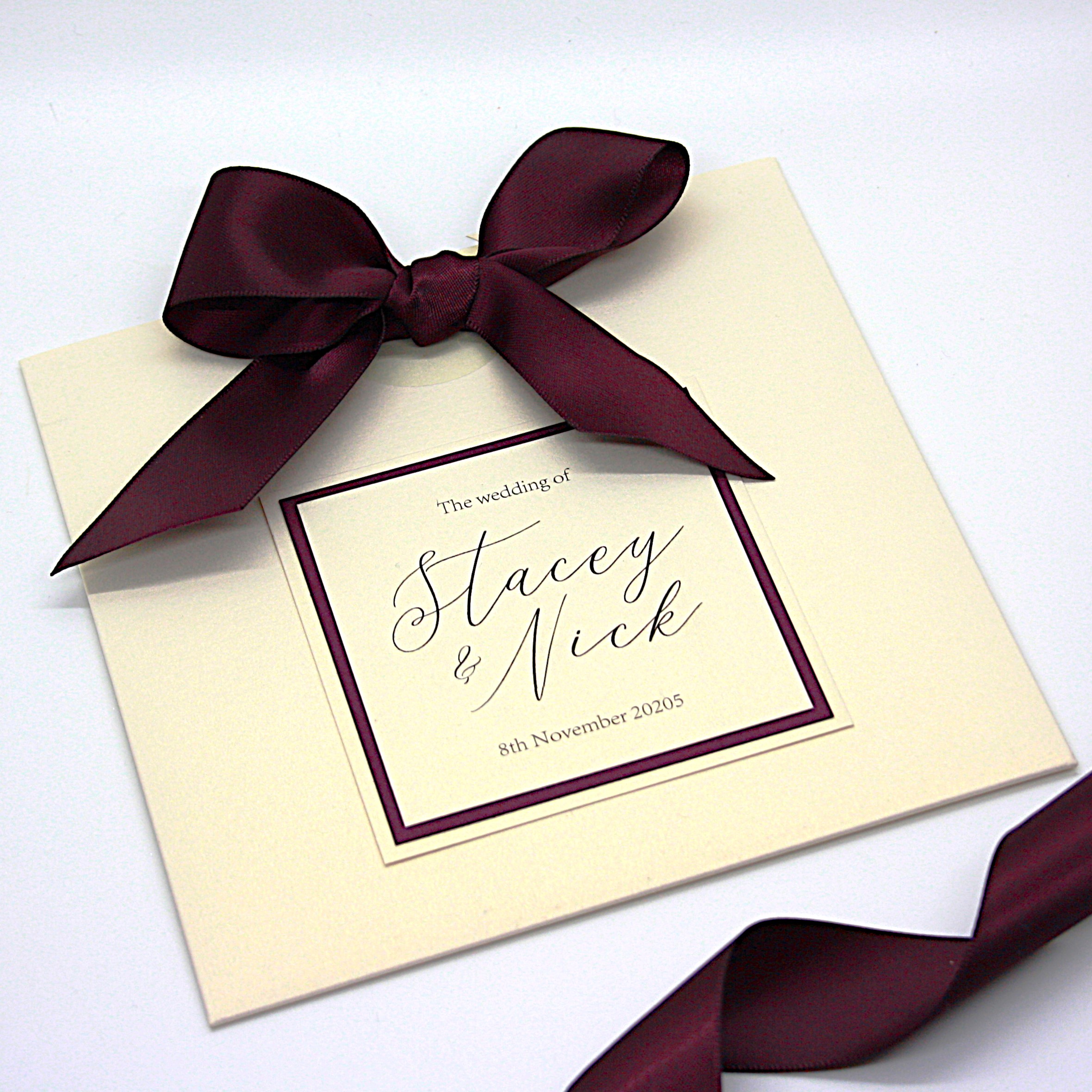 Wallet Style Wedding Invitation with a Large Burgundy Red Bow